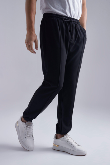 Mjukisbyxor I Slim Fit Med Dekorativa Veck, Black